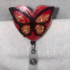 Red and Gold Butterfly Heart Badge reel